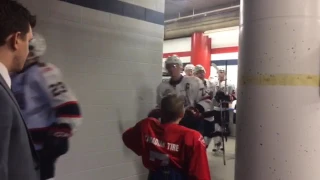 Regina pats heading to warm up.