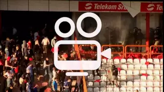 FOOTBALL SOCCER FANS THROWING SEATS AT RIOT POLICE