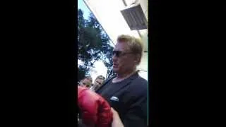 Dolph Lundgren signing autographs for fans