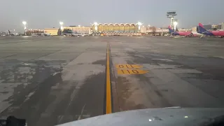 Boeing 737 NG cockpit view approaches boarding gate