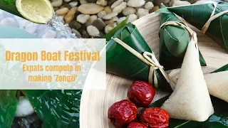 China's Dragon Boat Festival - Expats compete in making 'zongzi'