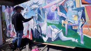 Artist Recreates Picasso’s Guernica on Destroyed Kyiv Bridge