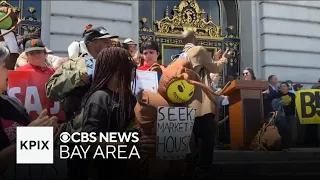 San Francisco community groups rally at city hall to speak out against proposed budget cuts