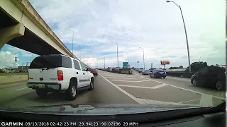White SUV nearly misses exit