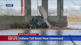 UPS Semi-truck goes off bridge, catches fire on Indiana Toll Road in Hammond