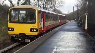 Class 144011 departing Haworth Railway Station for Keighley