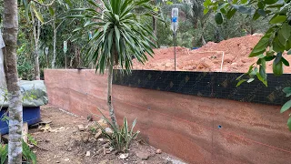 Building a rammed earth house in Thailand