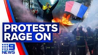 Molotov cocktails hit French police as furious protest rages on in France | 9 News Australia