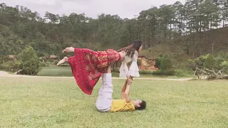 Performing super romantic Cute couple Acro Yoga Dance