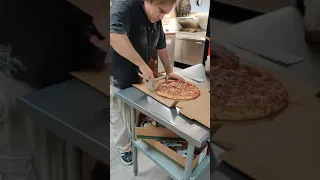 Cutting a pizza into 10 slices