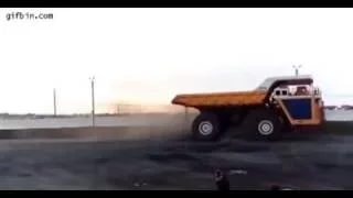 450 ton dump truck crushes car