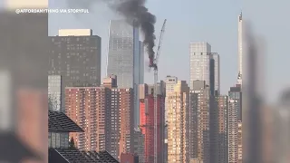 New York crane catches fire, partially collapses on Manhattan high rise