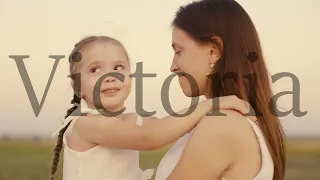 happy family. mother plays with child daughter nature. kid mom kiss and hug outdoor. happy family