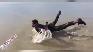 Guy swimming with taxedo 😂😂 very funny