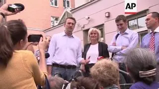 Opposition figure Navalny in court for hearing on embezzlement charges