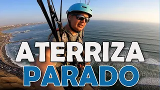 Stand up from the harness to LAND in PARAGLIDING