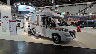 Rear queen bed + changing room. Malibu T500 QB motorhome tour