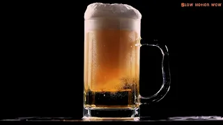 замедленная съёмка как пиво с пеной наливается в бокал- (videos slow motion)