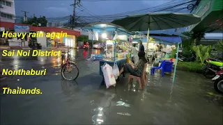 Heavy rain again flooded Sai Noi district in Thailand