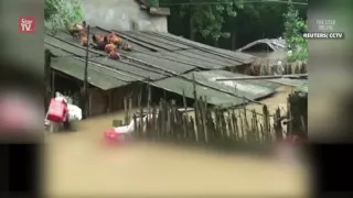 More than 120 feared dead in China floods