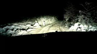 Peugeot 508 RXH on snowy, small road_down hill