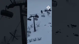 Ski lift passengers rush to safety as strong winds toss gondolas into the air in Italy