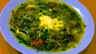 Green cabbage soup with sorrel. Sorrel soup with egg. Green borscht.
