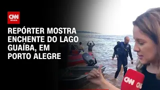 Repórter mostra enchente do Lago Guaíba, em Porto Alegre