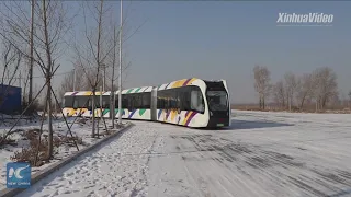 China tests smart electric train running on virtual tracks in frigid weather