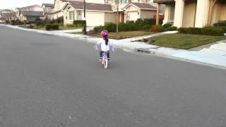 Tessa's ride on a bike without training wheels