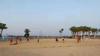 Football time on the beach.Activity vacation In Dream Lagoon Aqua park resort Marsa Alam.Egypt 2022.