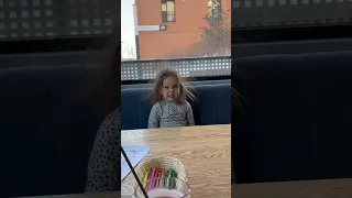 Girl’s Hair Gets an Electric Charge from a Hat