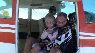 Dad skydiving with 5 years old daughter