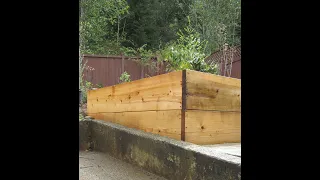 Building raised garden beds on a slope.