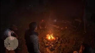 Micah talking at the campfire