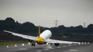 MONARCH A320 DIFFICULT LANDING IN STRONG WINDS & WINDSHEAR...BOUNCE, FLOAT, GO-AROUND?!