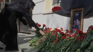 Russians place flowers in honour of President Raisi outside Iran embassy in Moscow