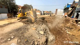 Powerful Komatsu Bulldozer Spreading Rock And Sand Into Water Making Foundation Village Road