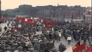 Civilians march during May Day Parade in East Berlin. HD Stock Footage
