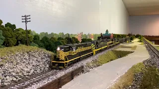 HO Scale NKP SD9s pull a 110 car loaded coal train at a scale 39mph.