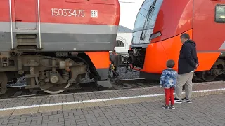 Diesel locomotive couples to Lastochka EMU train. Veliky Novgorod – Novgorod Luzhsky