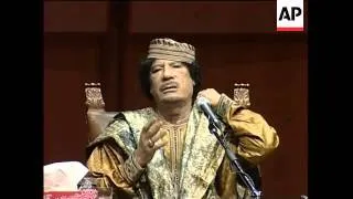 Gadhafi continues visit, meets invited women