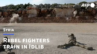 Rebel Syrian fighters train in Idlib | AFP