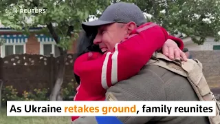 Family reunites in retaken Ukraine town