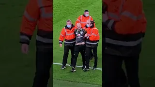 irish fan invades pitch. Ireland v lithuania