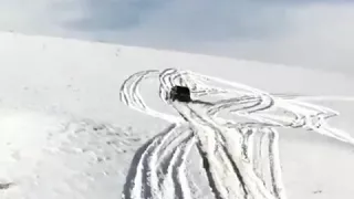 Toyota Landcruiser snow hill climb