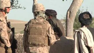 Marines interact with locals in Helmand Province