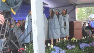 Emma Sulkowicz, CC '15, walks across Columbia College Class Day stage with mattress