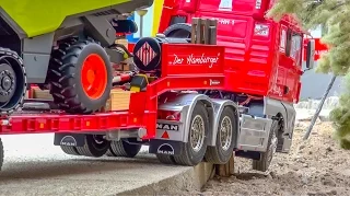 R/C trucks, excavators & more in ACTION on a nice indoor display!