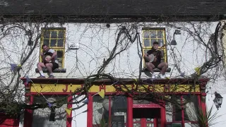 Irish Musicians Played Irish Music Outside of a Pub Windows